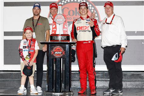 Harrison Burton seals win No. 100 for Wood Brothers.